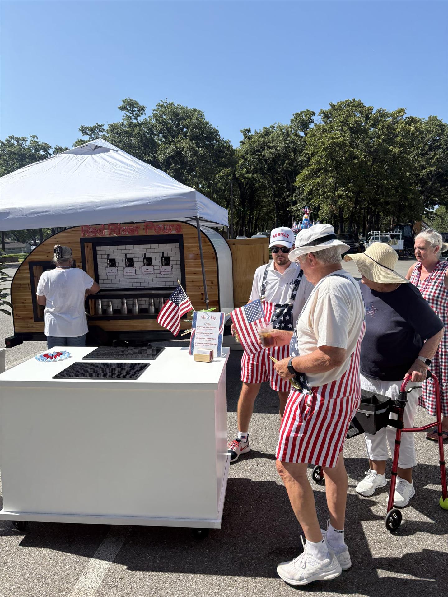 Guests enjoying drinks at a Red River Pours event