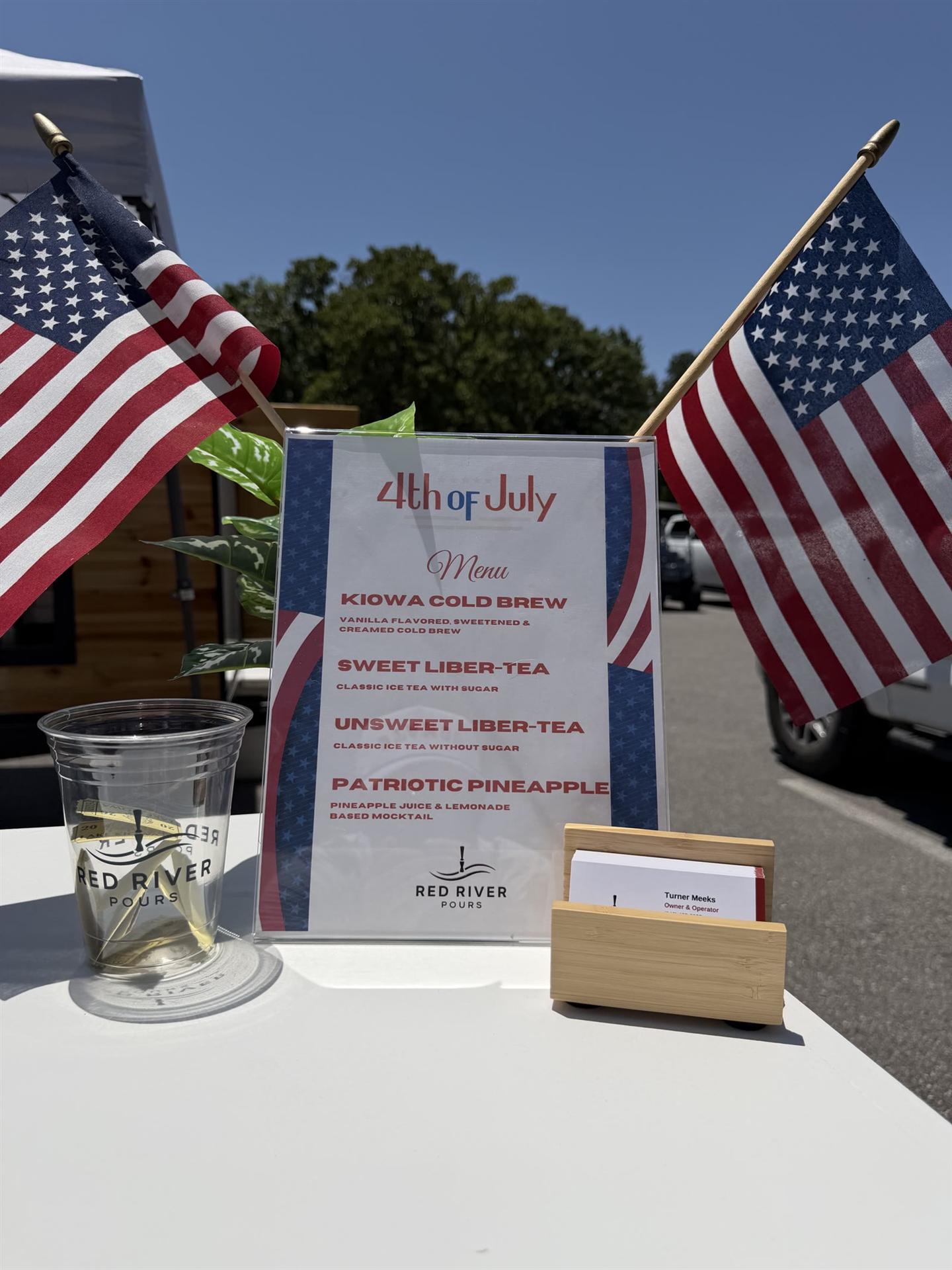 Custom drink menu displayed at a Red River Pours event